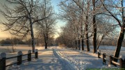 Snowy road under sunset